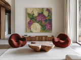 Hydrangea Delight I by Carol Rowan. Shown as extra-large giant wall art in a modern living room. Available as an archival giclee rolled canvas, fine art paper, or poster print. SKU 2414a.