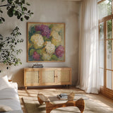 Hydrangea Delight II by Carol Rowan. Shown in a natural wood frame in a cozy modern living room. Available as an archival giclee rolled canvas, fine art paper, or poster print. SKU 2415a.