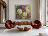 Hydrangea Delight II by Carol Rowan. Shown as extra-large giant wall art in a modern living room. Available as an archival giclee rolled canvas, fine art paper, or poster print. SKU 2415a.