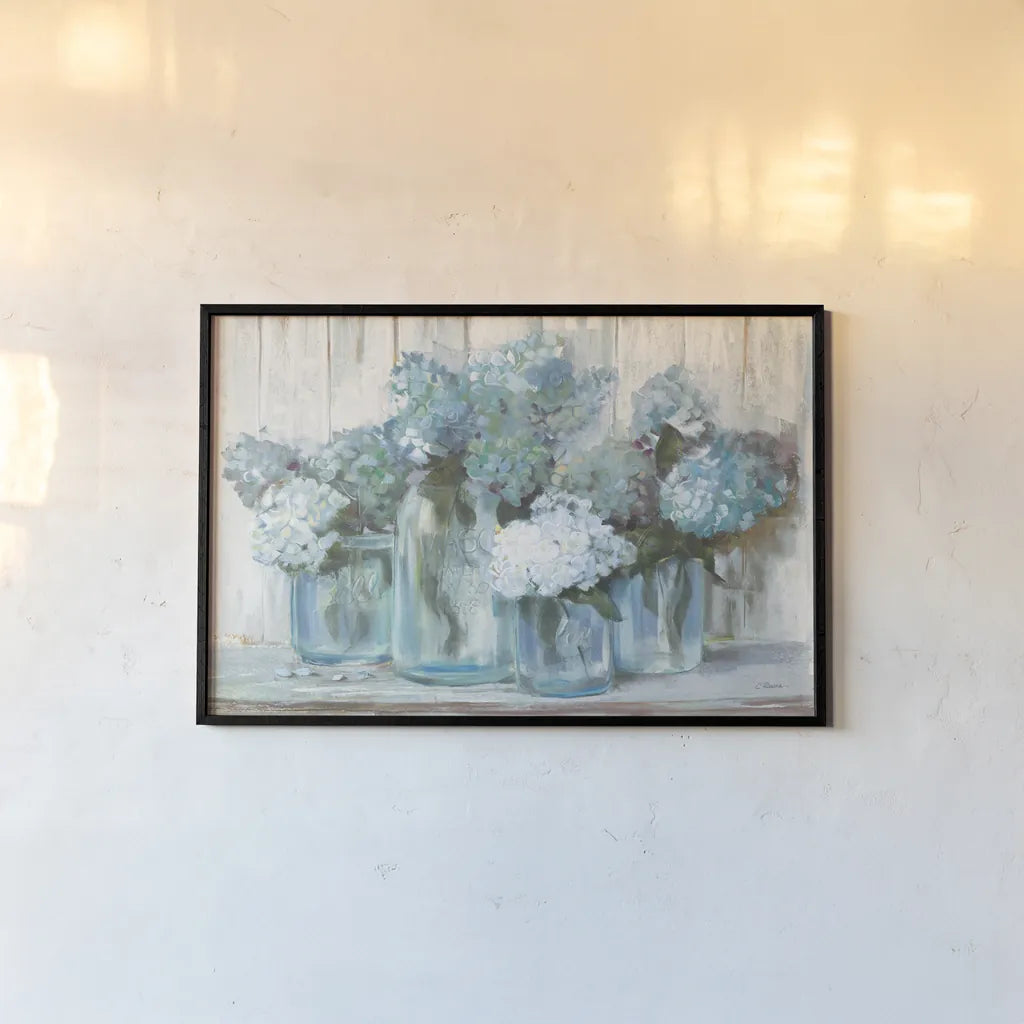 Hydrangeas in Glass Jars Blue Crop by Carol Rowan. shown as a paper print in a black flame. Available as a archival giclee rolled canvas, fine art paper, or poster print. SKU 46617i.