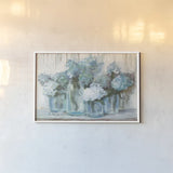 Hydrangeas in Glass Jars Blue Crop by Carol Rowan. shown as a paper print in a white frame. Available as a archival giclee rolled canvas, fine art paper, or poster print. SKU 46617i.