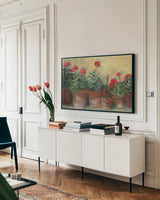 Kathleens Geraniums Crop by Carol Rowan. shown as a framed stretched canvas in a living room above a console. Available as a archival giclee rolled canvas, fine art paper, or poster print. SKU 7933i.