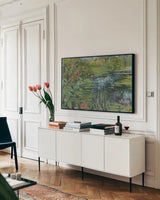 Peaceful Pond by Carol Rowan. shown as a framed stretched canvas in a living room above a console. Available as a archival giclee rolled canvas, fine art paper, or poster print. SKU 36214i.