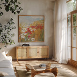 Poppies and Larkspur II by Carol Rowan. Shown in a natural wood frame in a cozy modern living room. Available as an archival giclee rolled canvas, fine art paper, or poster print. SKU 8172a.