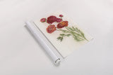 Red Ranunculus by Carol Rowan. shown as a rolled paper print. Available as archival giclee rolled canvas, fine art paper, or poster print. SKU 95140h.