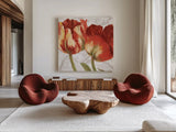 Spring Tulips Red I by Carol Rowan. Shown as extra-large giant wall art in a modern living room. Available as an archival giclee rolled canvas, fine art paper, or poster print. SKU 42412a.