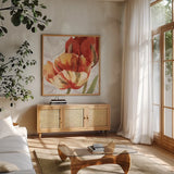 Spring Tulips Red II by Carol Rowan. Shown in a natural wood frame in a cozy modern living room. Available as an archival giclee rolled canvas, fine art paper, or poster print. SKU 42413a.