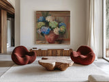 Summer Hydrangea by Carol Rowan. Shown as extra-large giant wall art in a modern living room. Available as an archival giclee rolled canvas, fine art paper, or poster print. SKU 100000a.