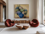Summer Hydrangea Blue Pot by Carol Rowan. Shown as extra-large giant wall art in a modern living room. Available as an archival giclee rolled canvas, fine art paper, or poster print. SKU 100001a.
