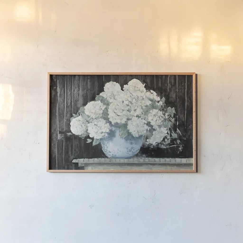 White Hydrangea on Black Crop by Carol Rowan. shown as a paper print in a natural frame. Available as a archival giclee rolled canvas, fine art paper, or poster print. SKU 50434i.
