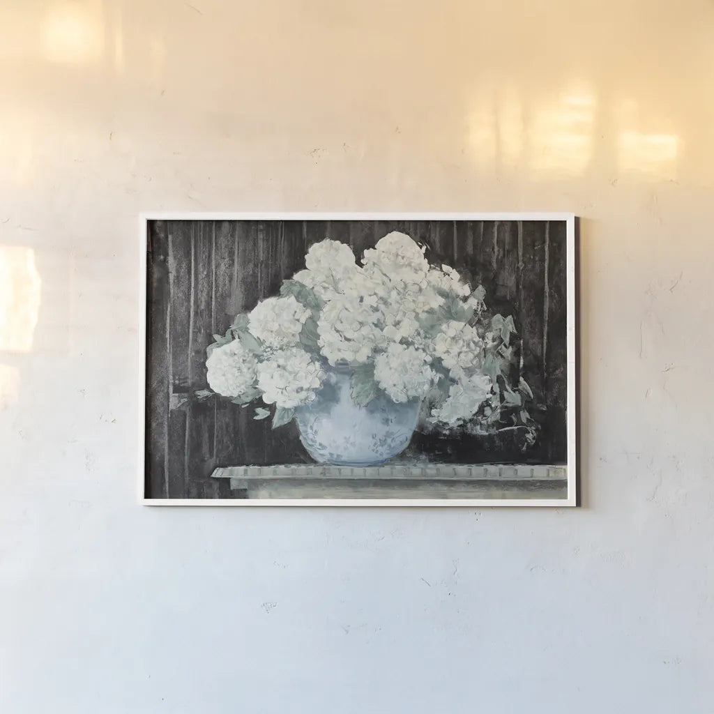 White Hydrangea on Black Crop by Carol Rowan. shown as a paper print in a white frame. Available as a archival giclee rolled canvas, fine art paper, or poster print. SKU 50434i.
