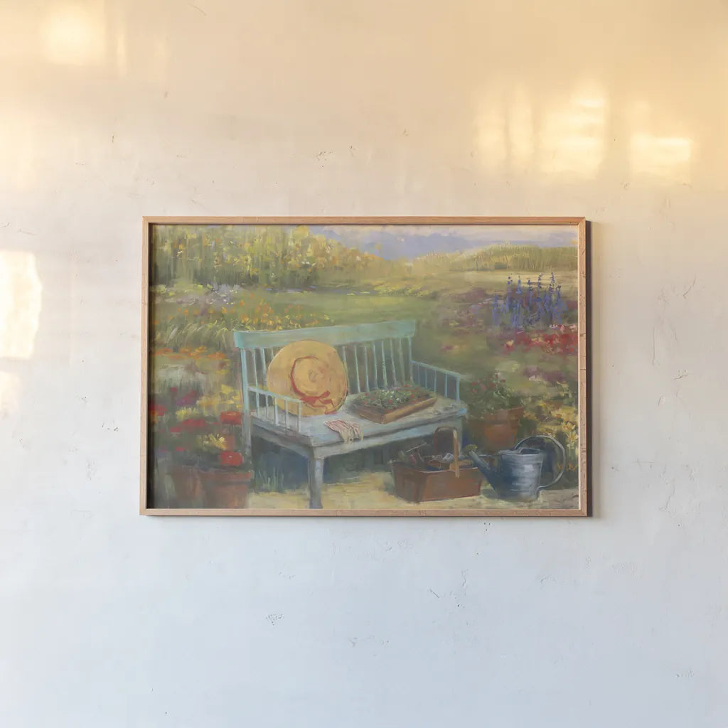 Working in the Garden by Carol Rowan. shown as a paper print in a natural frame. Available as a archival giclee rolled canvas, fine art paper, or poster print. SKU 12788i.