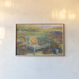 Working in the Garden by Carol Rowan. shown as a paper print in a natural frame. Available as a archival giclee rolled canvas, fine art paper, or poster print. SKU 12788i.