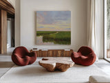 Brilliant Marsh Sunset by Carson Overstreet. Shown as extra-large giant wall art in a modern living room. Available as an archival giclee rolled canvas, fine art paper, or poster print. SKU 99714a.