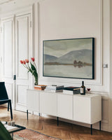 Misty View by Carson Overstreet. shown as a framed stretched canvas in a living room above a console. Available as a archival giclee rolled canvas, fine art paper, or poster print. SKU 96857i.