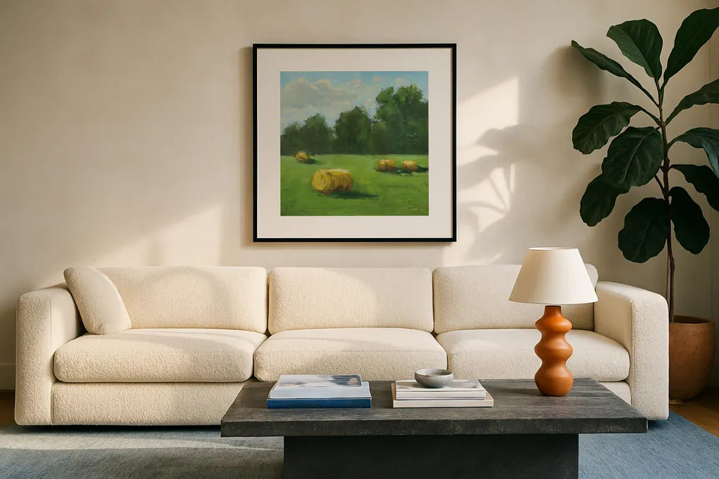 Summer Hay Field by Carson Overstreet. Displayed in a glass frame with matte in a clean modern living room. Available as an archival giclee rolled canvas, fine art paper, or poster print. SKU 99028a.