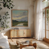 Sundown Over the Marsh Creek by Carson Overstreet. Shown in a natural wood frame in a cozy modern living room. Available as an archival giclee rolled canvas, fine art paper, or poster print. SKU 97454a.