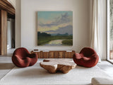 Sundown Over the Marsh Creek by Carson Overstreet. Shown as extra-large giant wall art in a modern living room. Available as an archival giclee rolled canvas, fine art paper, or poster print. SKU 97454a.
