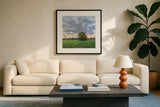 Tree at Sunset by Carson Overstreet. Displayed in a glass frame with matte in a clean modern living room. Available as an archival giclee rolled canvas, fine art paper, or poster print. SKU 102035a.