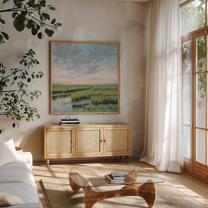 Winding Marsh Creek at Sundown by Carson Overstreet. Shown in a natural wood frame in a cozy modern living room. Available as an archival giclee rolled canvas, fine art paper, or poster print. SKU 99337a.