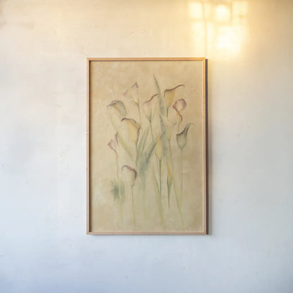 Blushing Calla Lilies by Cheri Blum. shown as a paper print in a natural frame. Available as a archival giclee rolled canvas, fine art paper, or poster print. SKU 7043h.