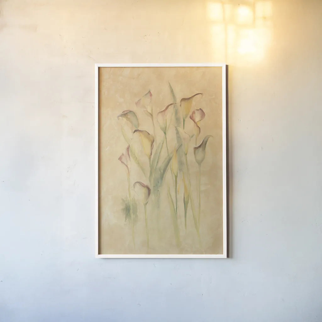 Blushing Calla Lilies by Cheri Blum. shown as a paper print in a white frame. Available as a archival giclee rolled canvas, fine art paper, or poster print. SKU 7043h.