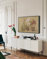 Collection of Orchids by Cheri Blum. shown as a framed stretched canvas in a living room above a console. Available as a archival giclee rolled canvas, fine art paper, or poster print. SKU 7226i.