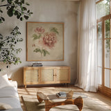 Coral Rose on Antique Linen Light by Cheri Blum. Shown in a natural wood frame in a cozy modern living room. Available as an archival giclee rolled canvas, fine art paper, or poster print. SKU 90525a.