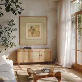 Exotic Floral II by Cheri Blum. Shown in a natural wood frame in a cozy modern living room. Available as an archival giclee rolled canvas, fine art paper, or poster print. SKU 8229a.