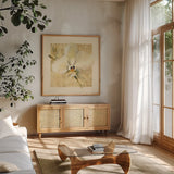 Exotic Floral III Crop by Cheri Blum. Shown in a natural wood frame in a cozy modern living room. Available as an archival giclee rolled canvas, fine art paper, or poster print. SKU 88531a.