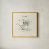Garden Watering Can by Cheri Blum. Shown in a natural wood glass frame for a timeless modern aesthetic. Available as an archival giclee rolled canvas, fine art paper, or poster print. SKU 71382a.