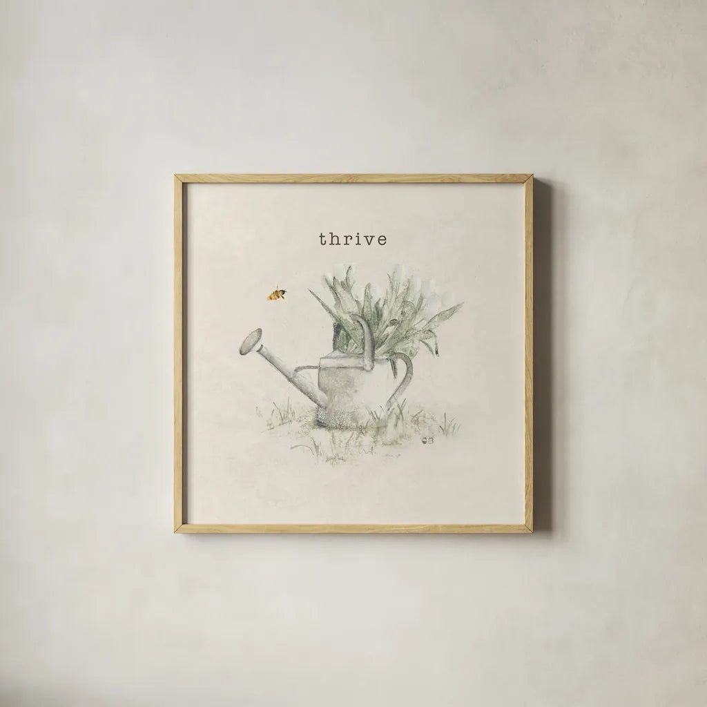 Garden Watering Can by Cheri Blum. Shown in a natural wood glass frame for a timeless modern aesthetic. Available as an archival giclee rolled canvas, fine art paper, or poster print. SKU 71382a.