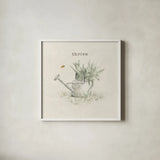 Garden Watering Can by Cheri Blum. Shown in a crisp white glass frame for a clean and minimalist style. Available as an archival giclee rolled canvas, fine art paper, or poster print. SKU 71382a.