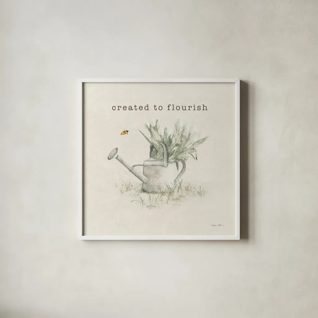 Garden Watering Can Flourish by Cheri Blum. Shown in a crisp white glass frame for a clean and minimalist style. Available as an archival giclee rolled canvas, fine art paper, or poster print. SKU 91500a.