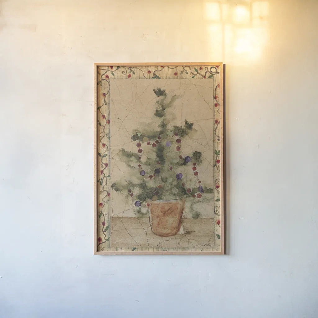 Garland Topiary by Cheri Blum. shown as a paper print in a natural frame. Available as a archival giclee rolled canvas, fine art paper, or poster print. SKU 7049h.