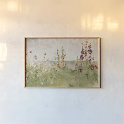 Hollyhocks by the Sea by Cheri Blum. shown as a paper print in a natural frame. Available as a archival giclee rolled canvas, fine art paper, or poster print. SKU 8256i.