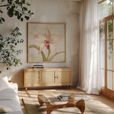 Orchid I by Cheri Blum. Shown in a natural wood frame in a cozy modern living room. Available as an archival giclee rolled canvas, fine art paper, or poster print. SKU 90728a.