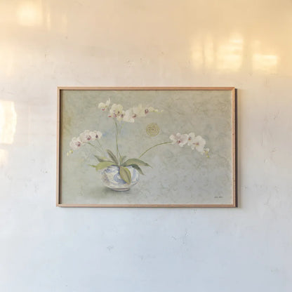 Orchids in a Porcelain Bowl by Cheri Blum. shown as a paper print in a natural frame. Available as a archival giclee rolled canvas, fine art paper, or poster print. SKU 7629i.
