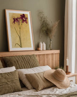 Purple Day Lily by Cheri Blum. shown as a paper print in a natural frame. Available as a archival giclee rolled canvas, fine art paper, or poster print. SKU 7538h.
