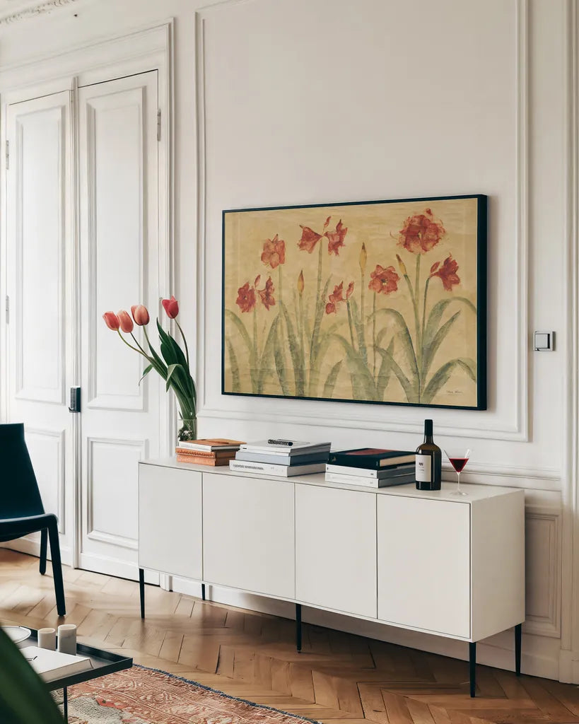 Row of Red Amaryllis by Cheri Blum. shown as a framed stretched canvas in a living room above a console. Available as a archival giclee rolled canvas, fine art paper, or poster print. SKU 7163i.