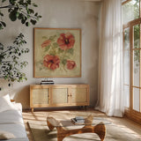 Soft Hibiscus I by Cheri Blum. Shown in a natural wood frame in a cozy modern living room. Available as an archival giclee rolled canvas, fine art paper, or poster print. SKU 7540a.