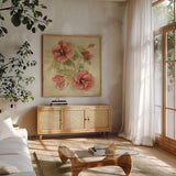Soft Hibiscus II by Cheri Blum. Shown in a natural wood frame in a cozy modern living room. Available as an archival giclee rolled canvas, fine art paper, or poster print. SKU 7541a.
