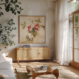 Spring Roses III by Cheri Blum. Shown in a natural wood frame in a cozy modern living room. Available as an archival giclee rolled canvas, fine art paper, or poster print. SKU 7431a.