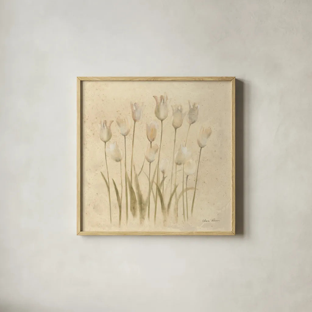 Stems of White Tulips by Cheri Blum. Shown in a natural wood glass frame for a timeless modern aesthetic. Available as an archival giclee rolled canvas, fine art paper, or poster print. SKU 7298a.