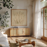 Stems of White Tulips by Cheri Blum. Shown in a natural wood frame in a cozy modern living room. Available as an archival giclee rolled canvas, fine art paper, or poster print. SKU 7298a.