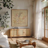 Tropical Square I by Cheri Blum. Shown in a natural wood frame in a cozy modern living room. Available as an archival giclee rolled canvas, fine art paper, or poster print. SKU 7254a.