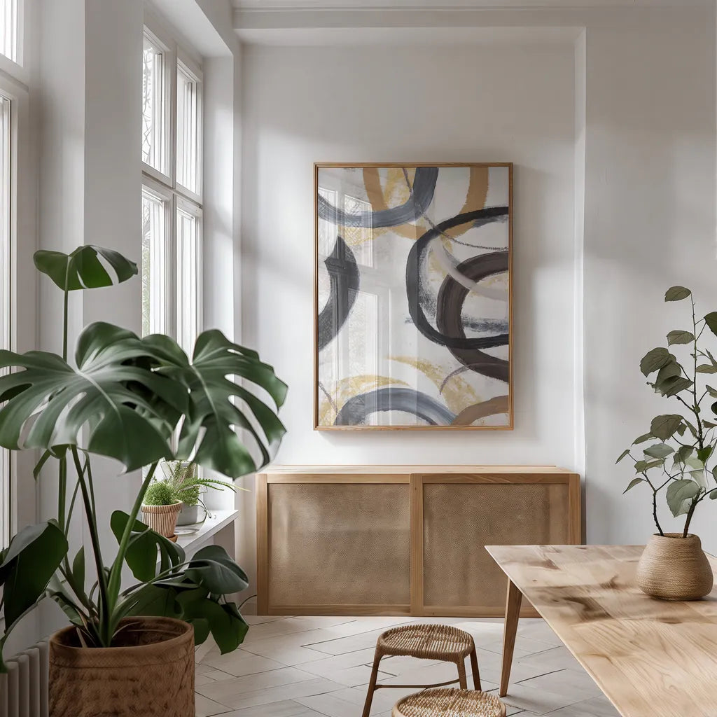 Dwell I Gold Neutral Crop by Cheryl Warrick. shown as a print in a natural wood frame in a dining room. Available as a archival giclee rolled canvas, fine art paper, or poster print. SKU 77621h.