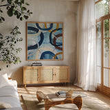 Dwell II by Cheryl Warrick. Shown in a natural wood frame in a cozy modern living room. Available as an archival giclee rolled canvas, fine art paper, or poster print. SKU 17736a.