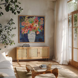 Floral Beauty II Striped Vase by Cheryl Warrick. Shown in a natural wood frame in a cozy modern living room. Available as an archival giclee rolled canvas, fine art paper, or poster print. SKU 86878a.