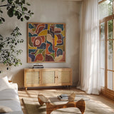 Fractured III by Cheryl Warrick. Shown in a natural wood frame in a cozy modern living room. Available as an archival giclee rolled canvas, fine art paper, or poster print. SKU 103273a.